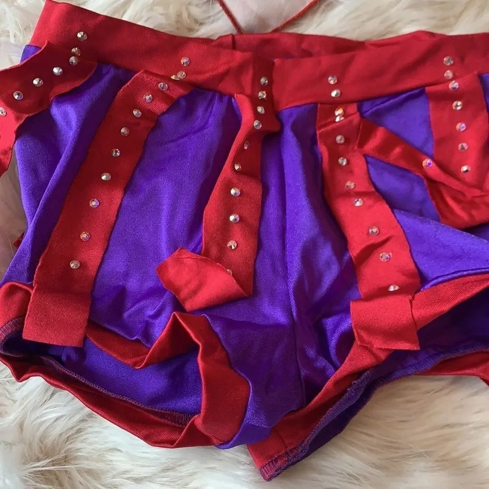 Custom dance costume with Swarovski crystals. Orange, Red and Purple Two Piece